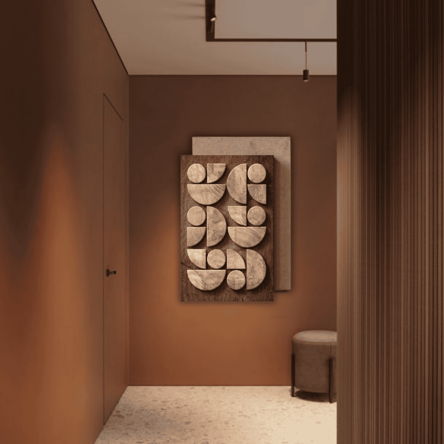 Decorative wall art in a room with brown walls and a door.