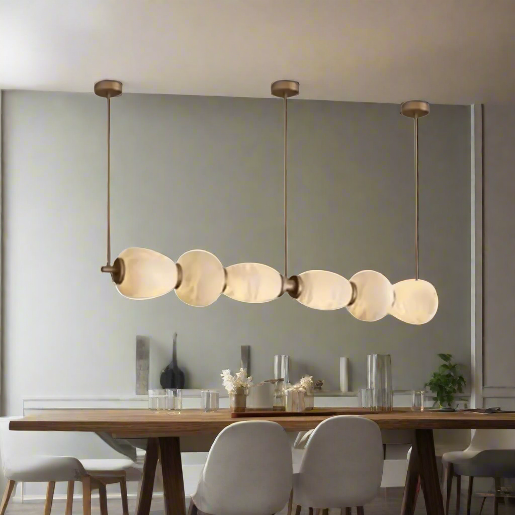 Modern pendant light with glass shades on a white background