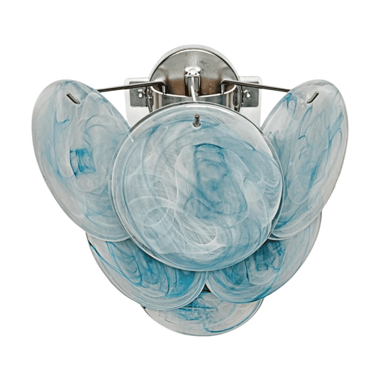 Decorative wall sconce with blue and white marbled design on a white background