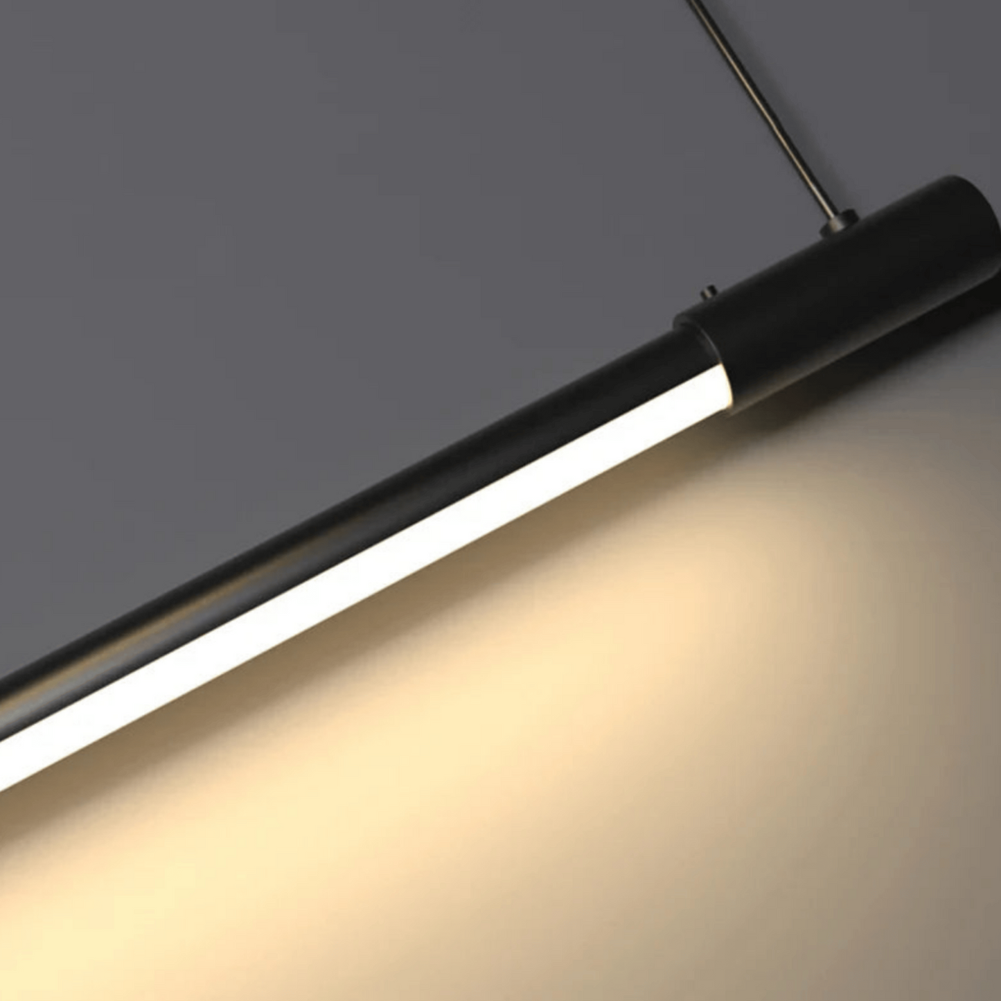 Modern pendant light fixture on a dark background