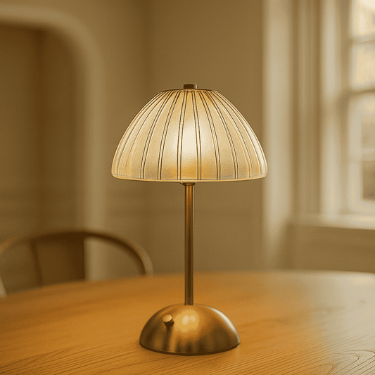 Small table lamp with a textured shade on a wooden surface.