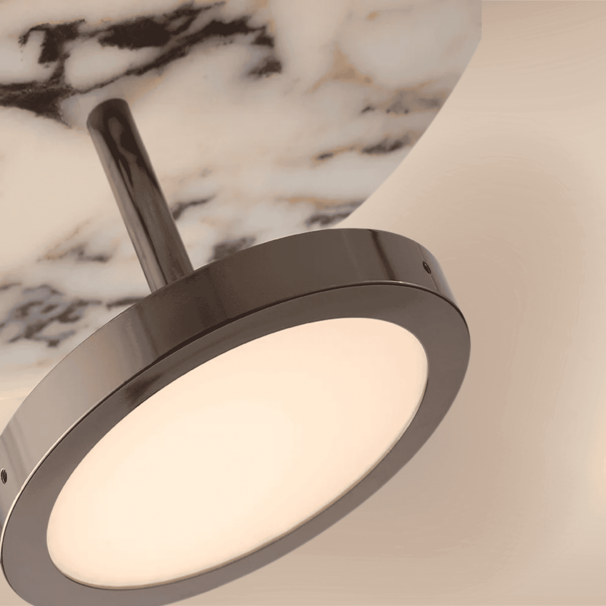 Close look at Modern marble disc pendant light with brushed metal fixture