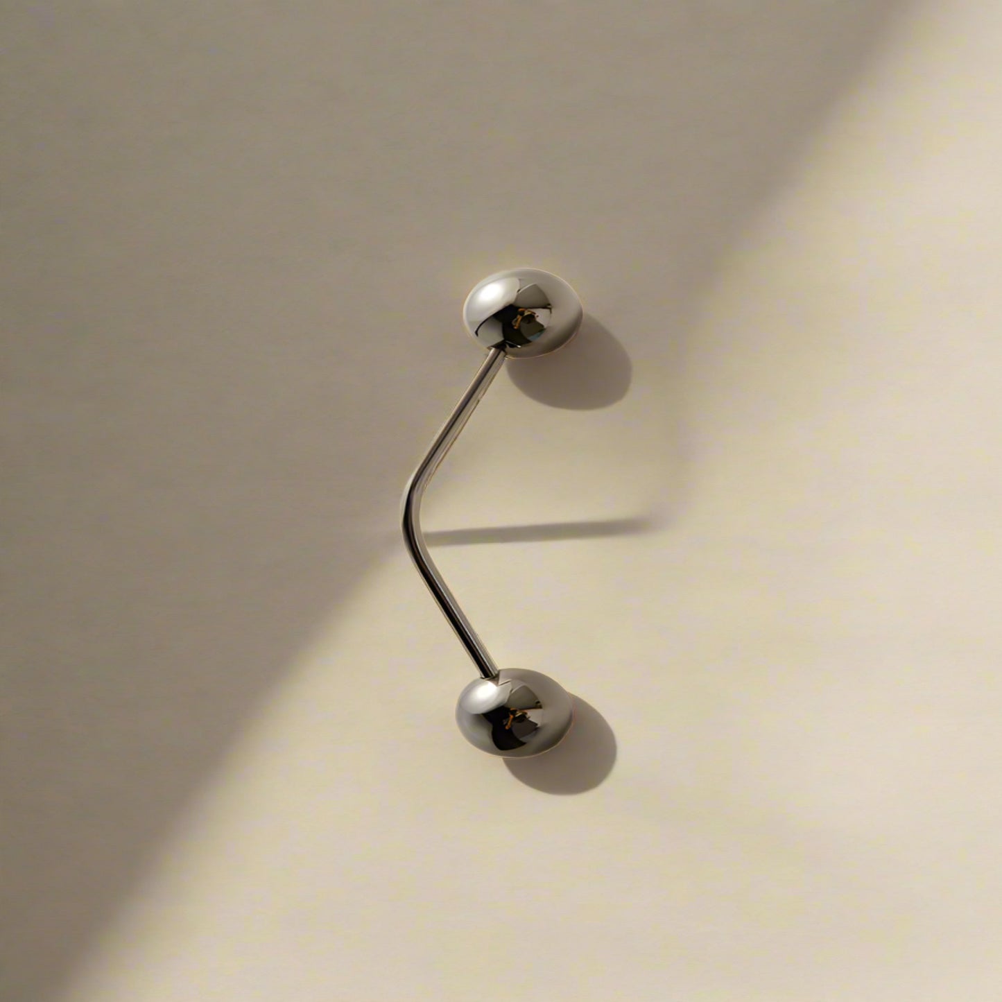 Silver handles on a beige backround
