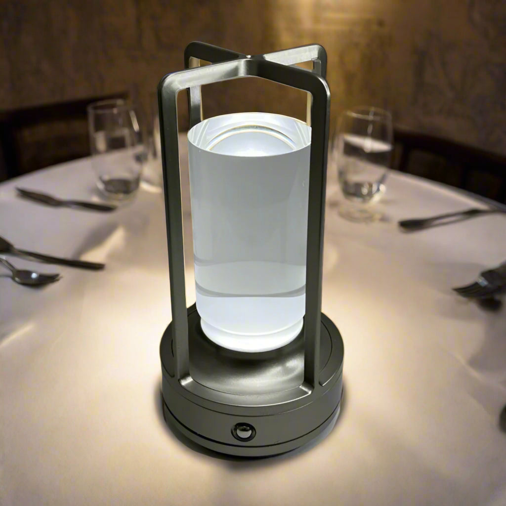 Camping lantern with a white glass cover on a white background