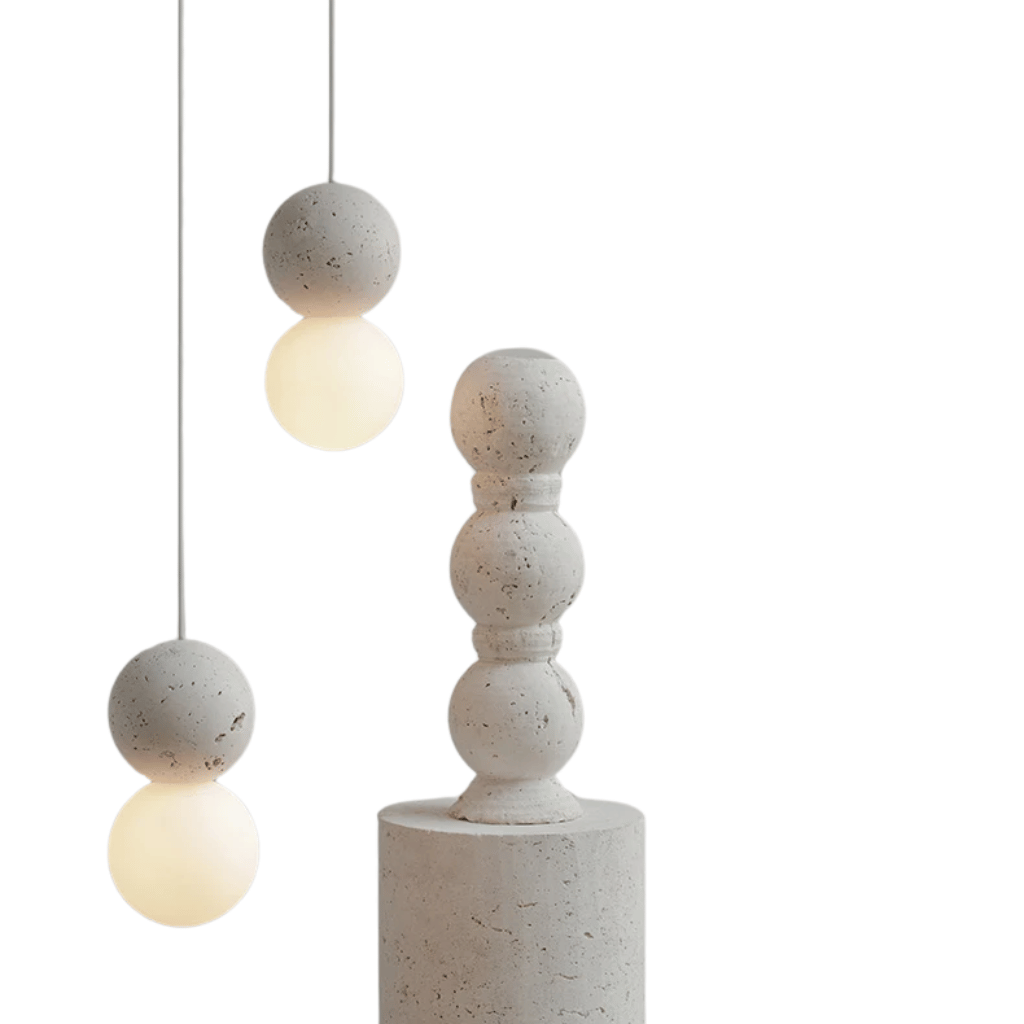 Concrete and glass pendant light on a white background