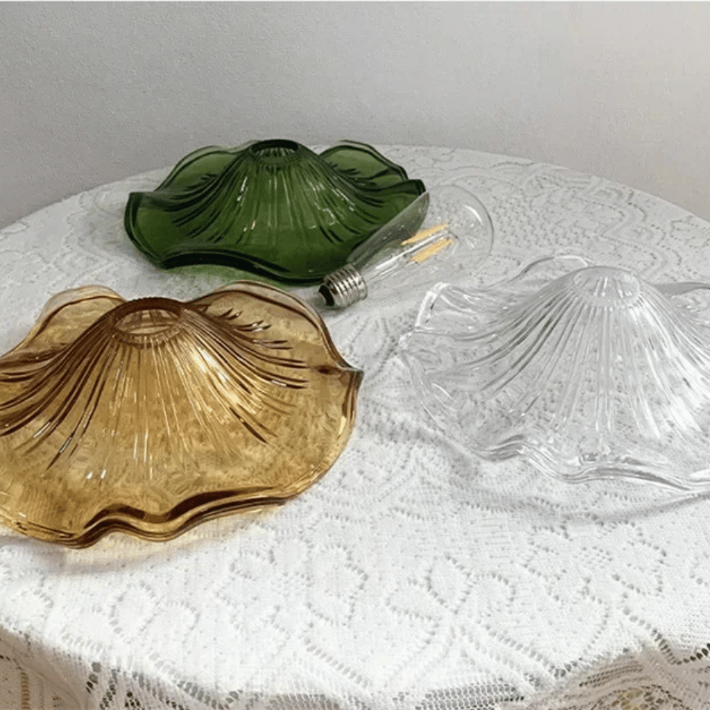 Brighten your home with the Nordic LED Pendant Light – Colorful Glass, showcasing elegant hues and a sleek copper finish.