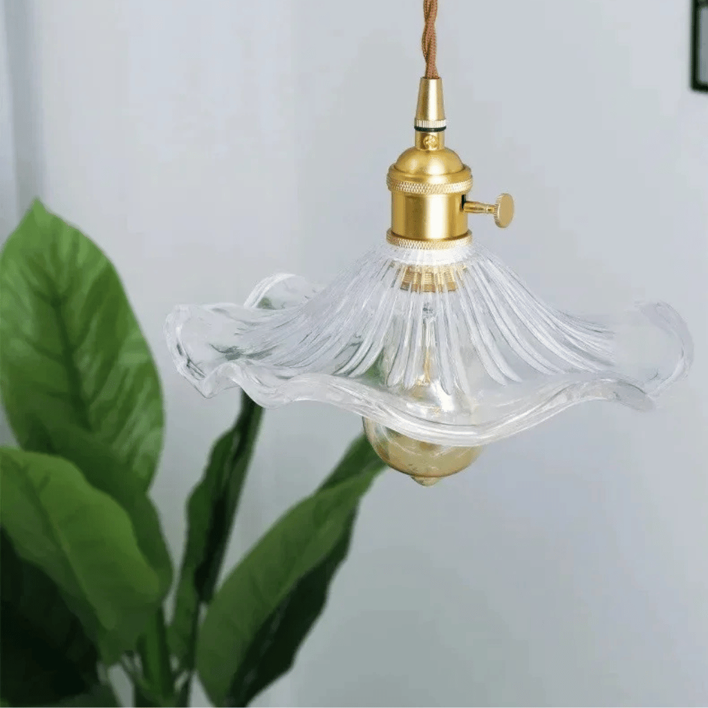 Illuminate your space with the Nordic LED Pendant Light – Colorful Glass, featuring a unique glass design and copper accents.