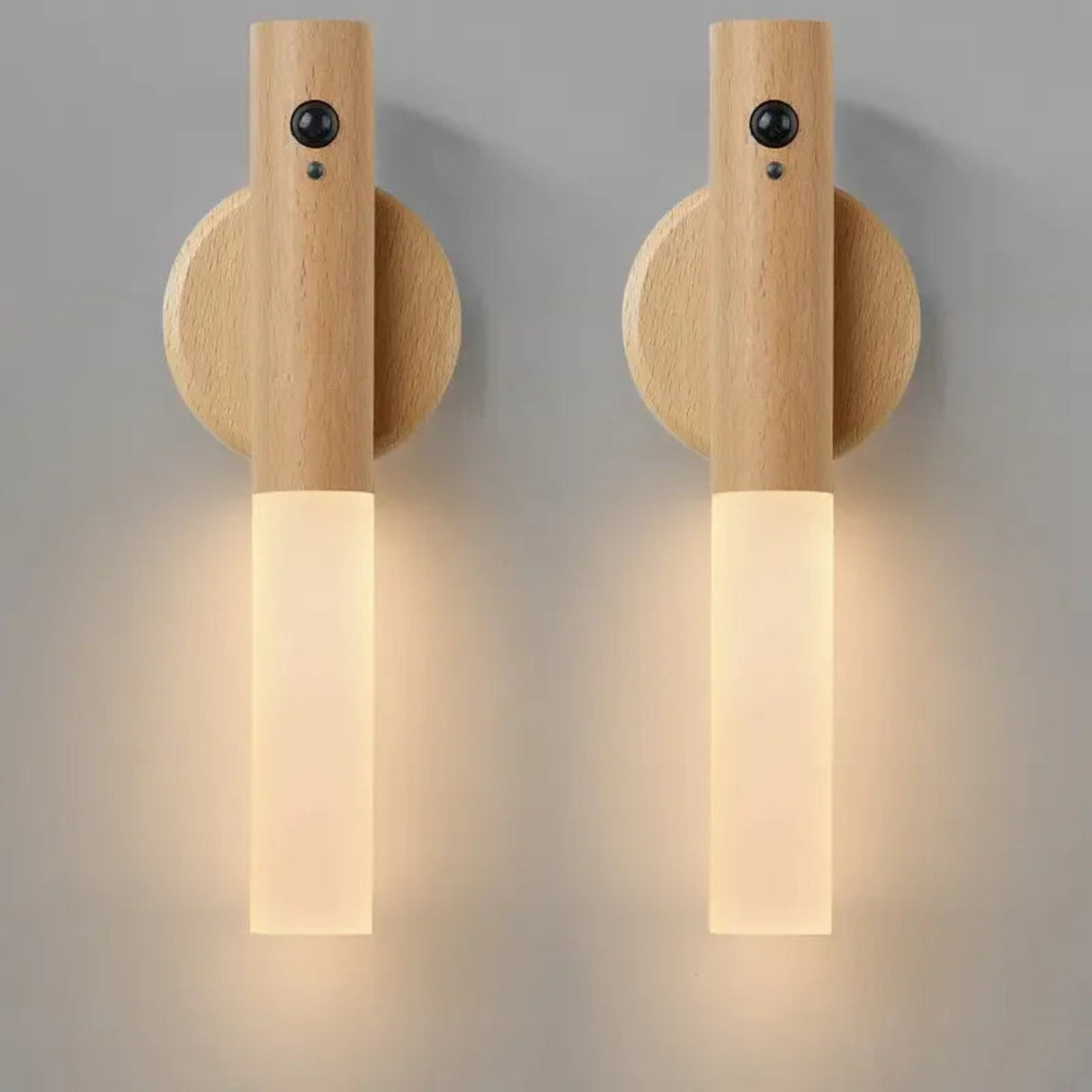Two wooden wall sconces on a gray background