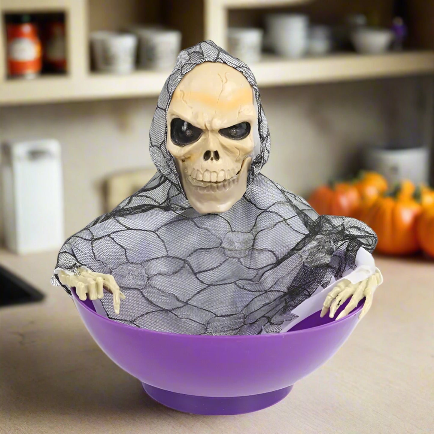Skeleton figure with a purple bowl on a white background