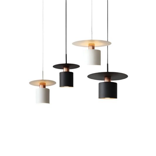 Modern pendant lights with black and white shades on a neutral background