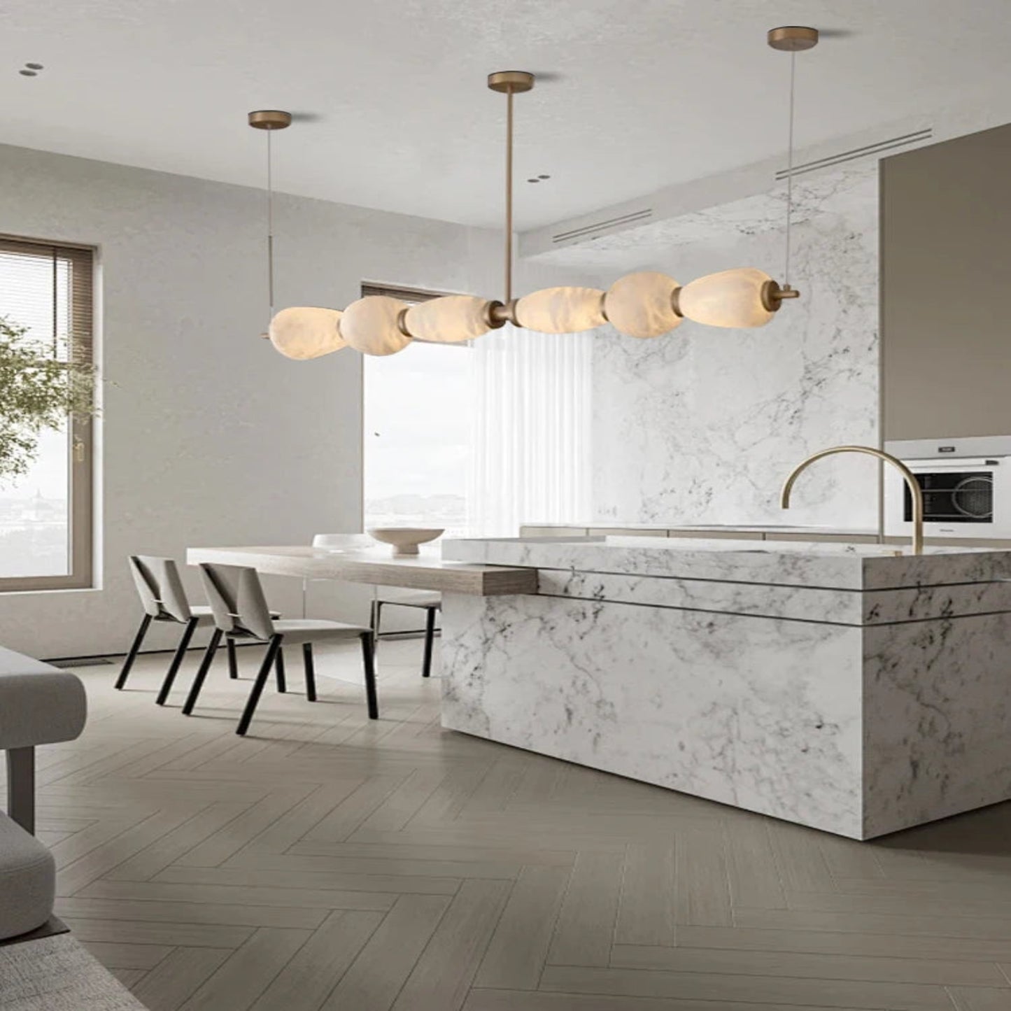 Modern kitchen with marble island and pendant lights