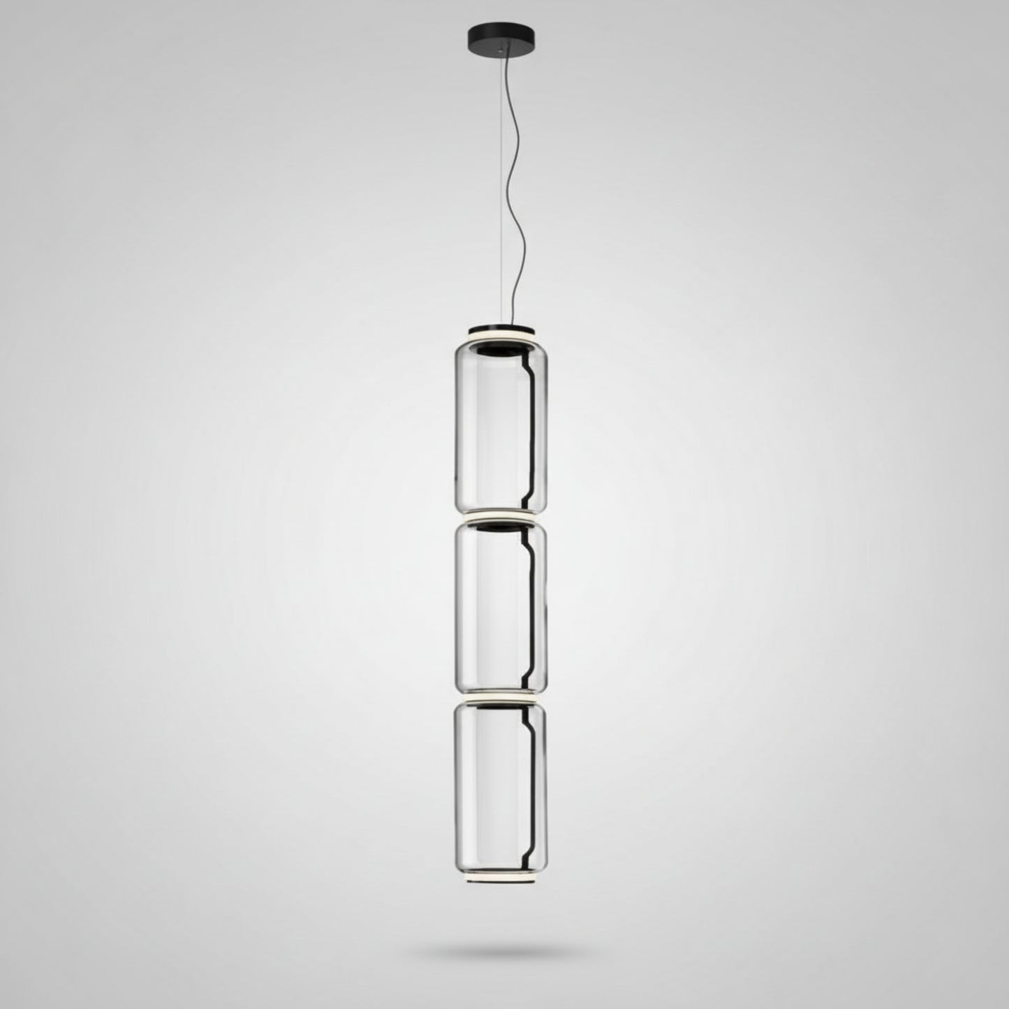 Modern pendant light with cylindrical design on a white background
