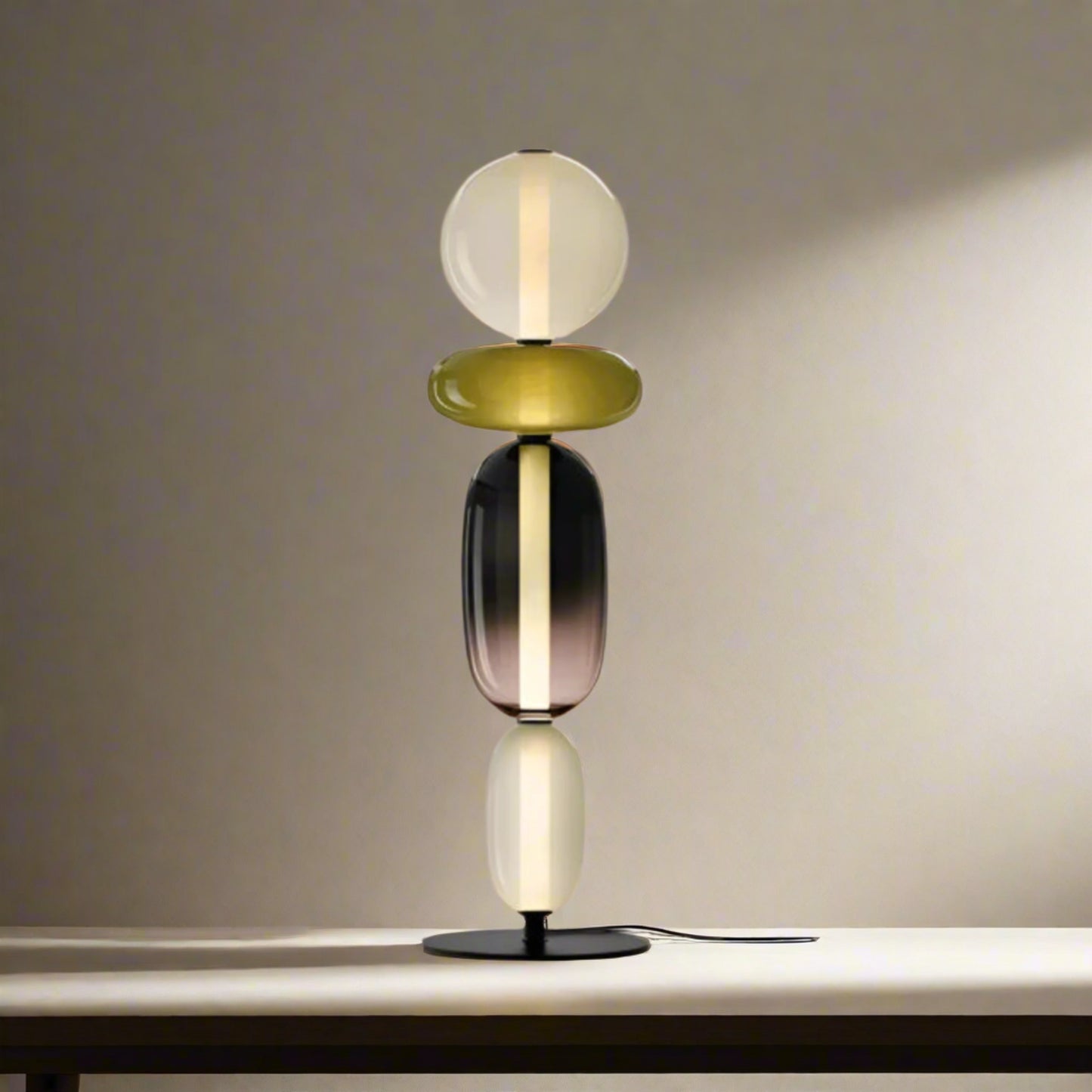 Table lamp with four spherical heads and dimensions labeled on a white background