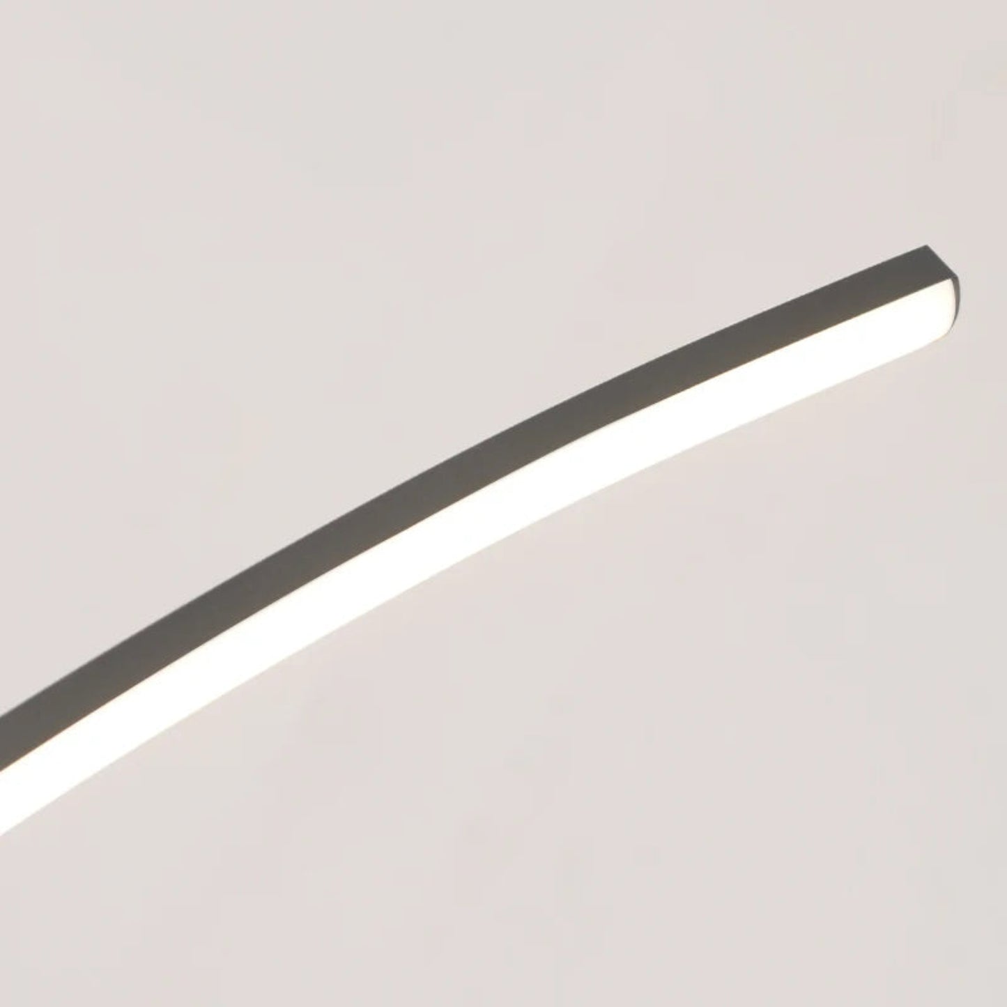 Modern ceiling light fixture on a neutral background