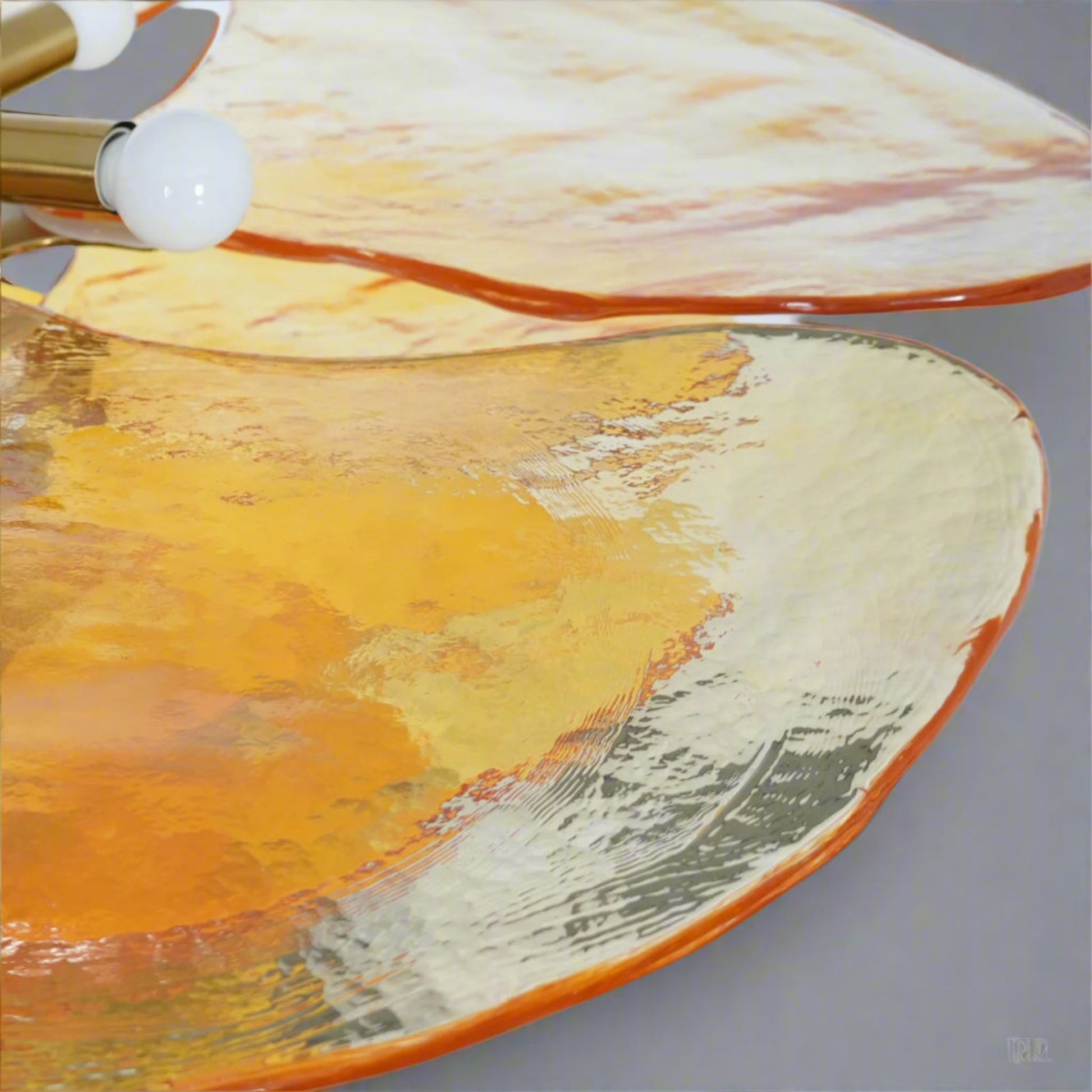 Close-up of a ceramic plate with abstract design on a white background