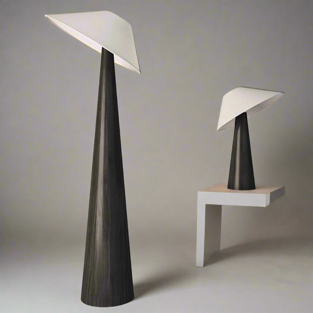 Two modern table lamps with white shades and dark wooden bases on a light gray background.