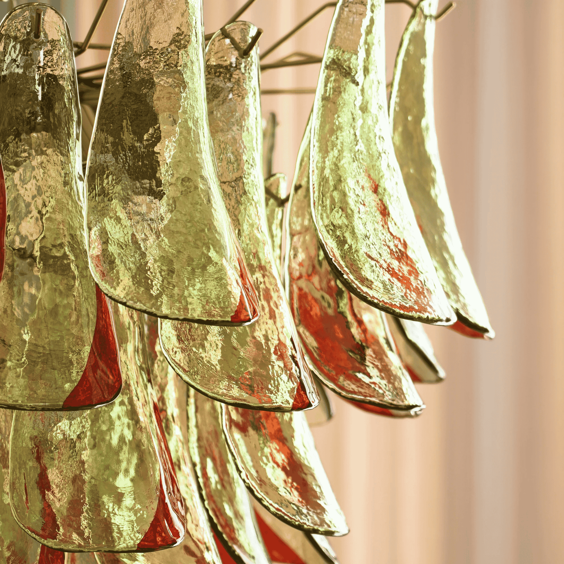 Close-up of a gold chandelier with a blurred background