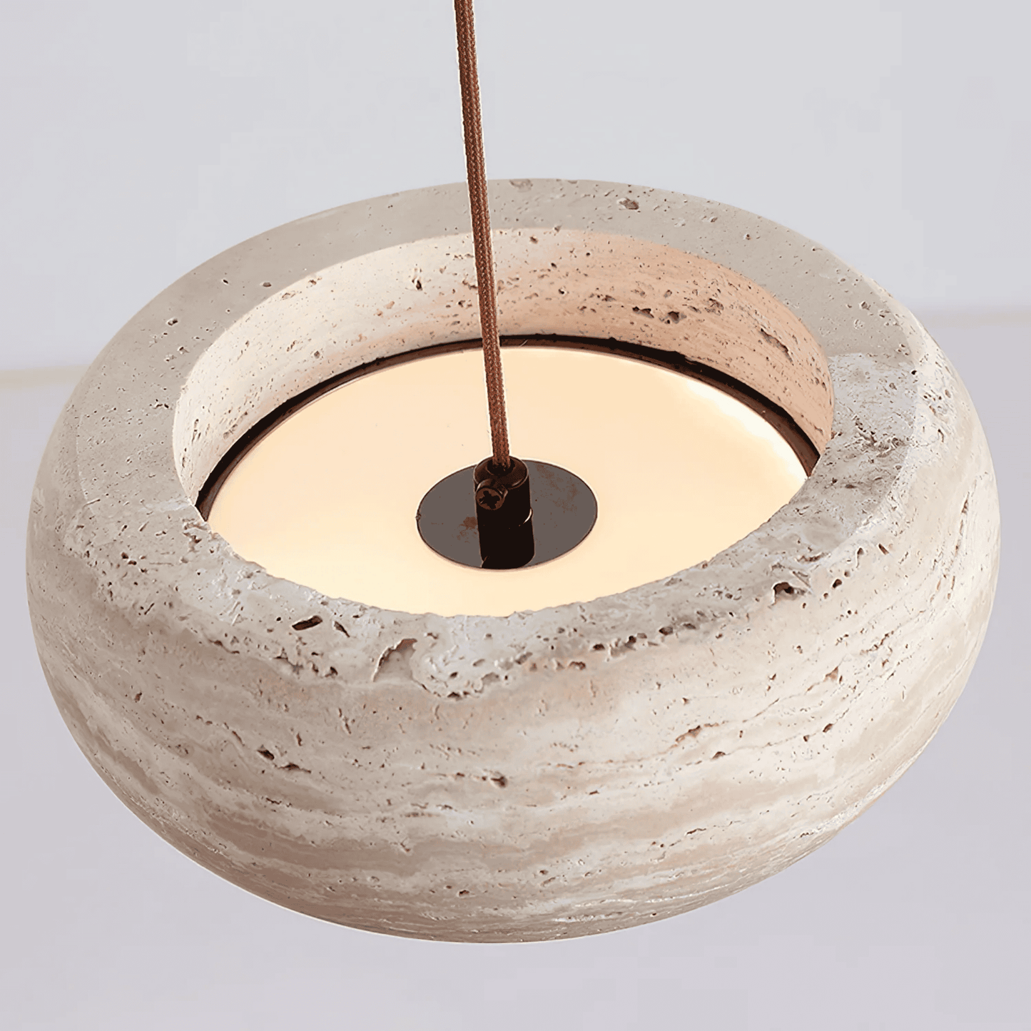 Concrete pendant light with a neutral background
