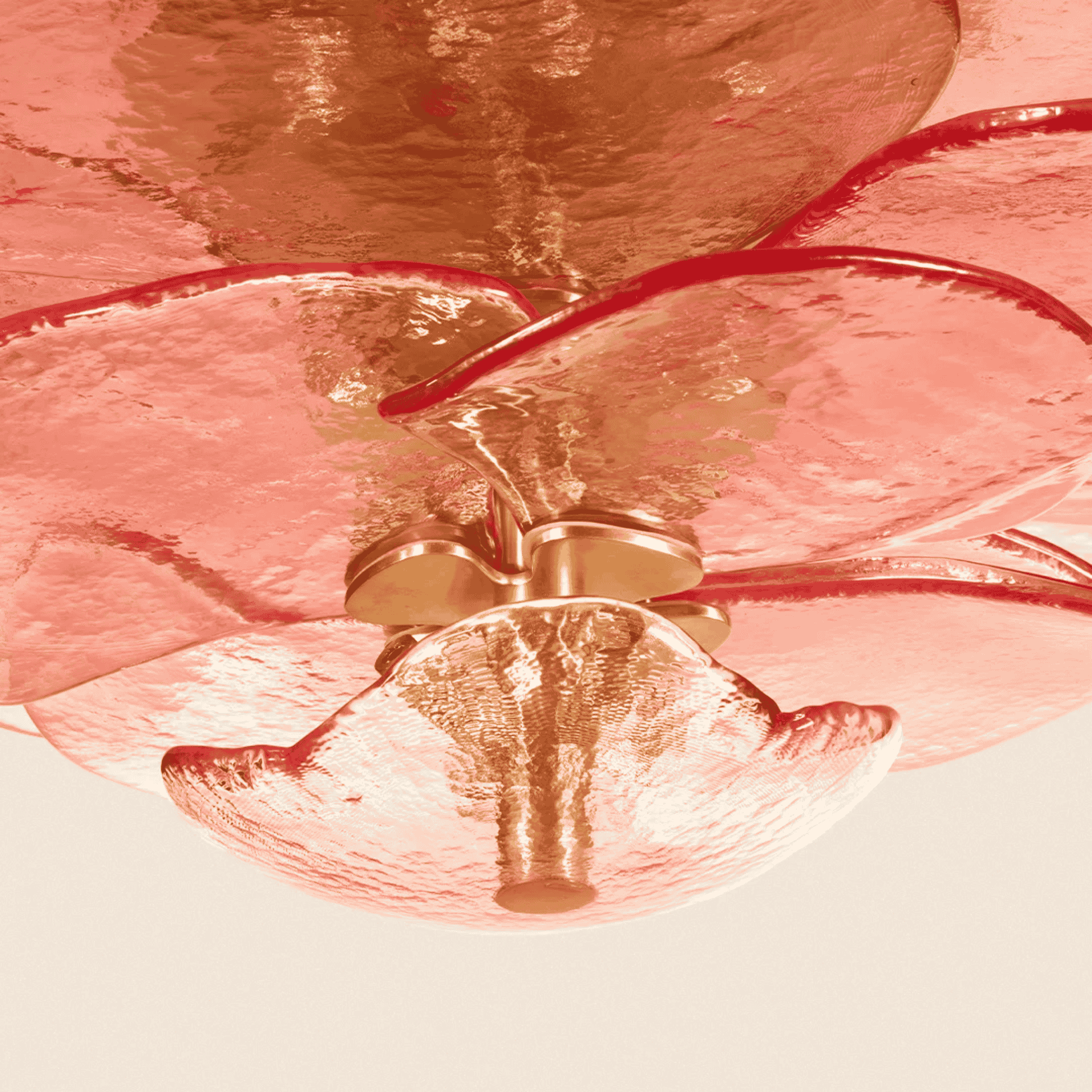 Close-up of a ceiling fan with metallic blades and light fixture.