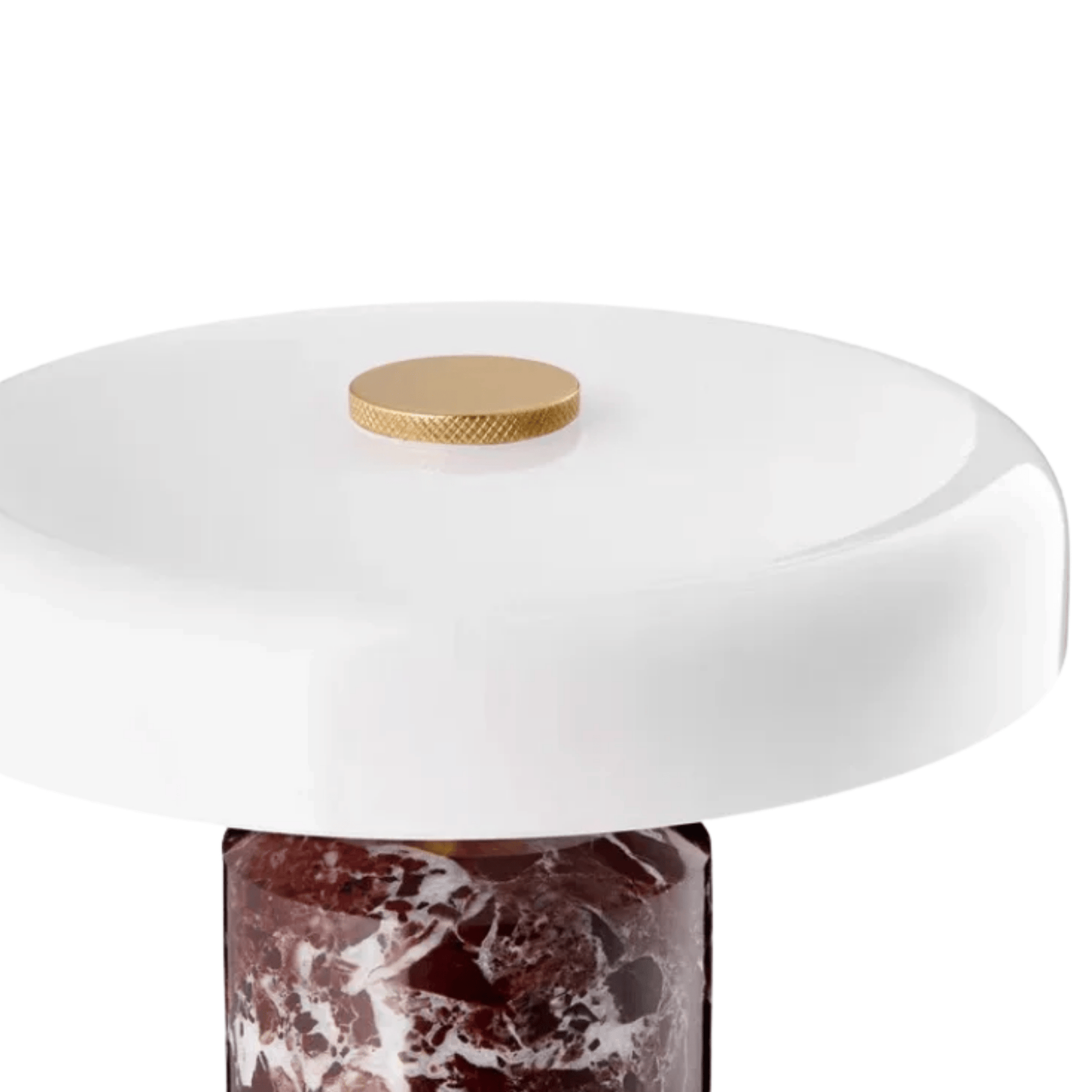 Table lamp with white shade and marble base on a white background