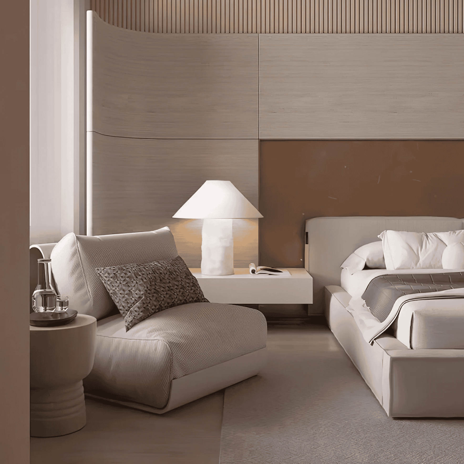 Modern bedroom with beige sofa, nightstand, and bed.