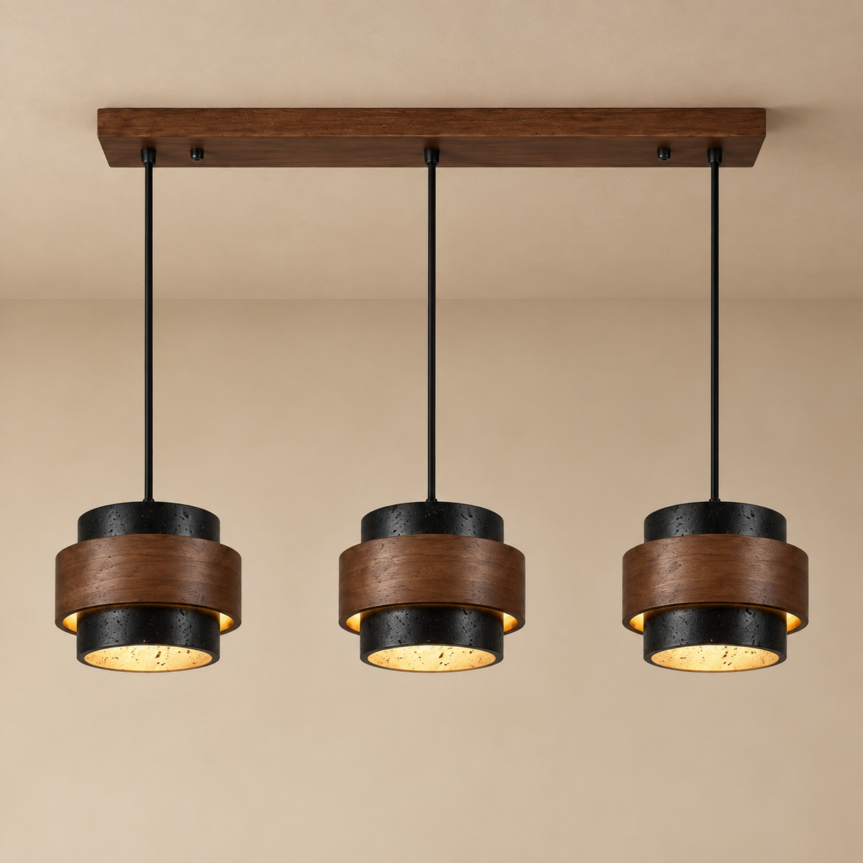 Three-light linear pendant ceiling fixture with dark wood and black metal shades, shown hanging against a beige wall.