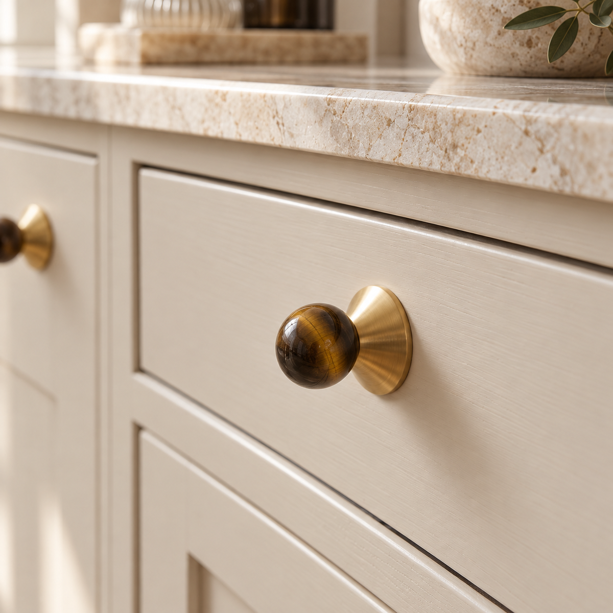 Solvi Brass Ball Cabinet Knobs - Amber Banded - Lifestyle on shaker cabinetry