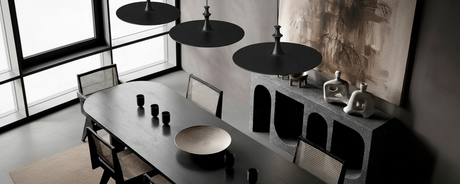 Beautiful modern pendant light hanging over dining table