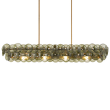 Round pendant light with glass disc shades on a white background