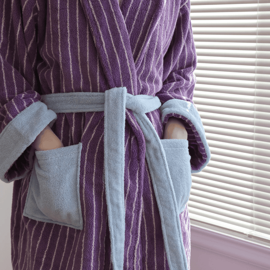 Purple and gray striped robe with a belt, close-up shot.