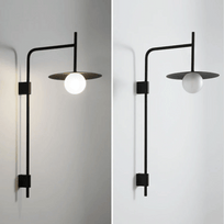 Modern wall-mounted light fixture with a black frame and white bulb on a plain background.