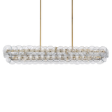 Modern pendant light with clear glass bubbles and gold accents on a white background