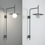 Modern wall-mounted light fixture on a neutral background