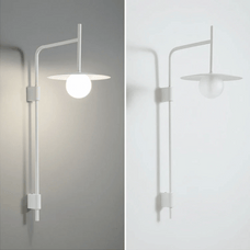 Modern wall-mounted light fixture on a plain background