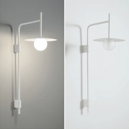 Modern wall-mounted light fixture on a plain background