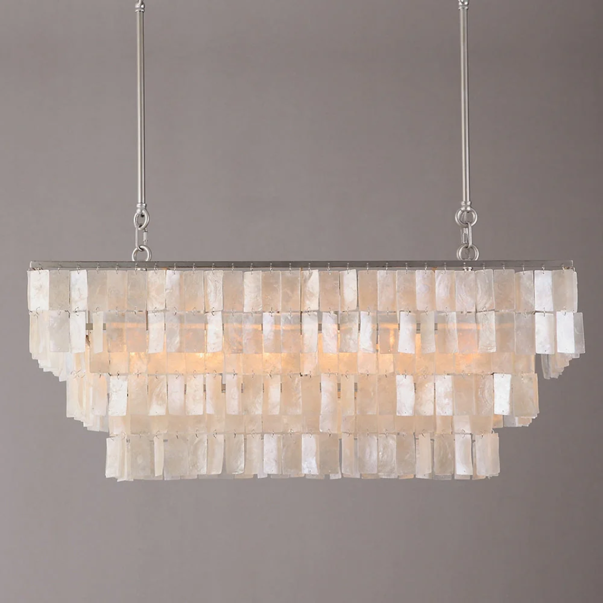 Chandelier with shell-like design on a gray background