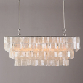 Chandelier with shell-like design on a gray background