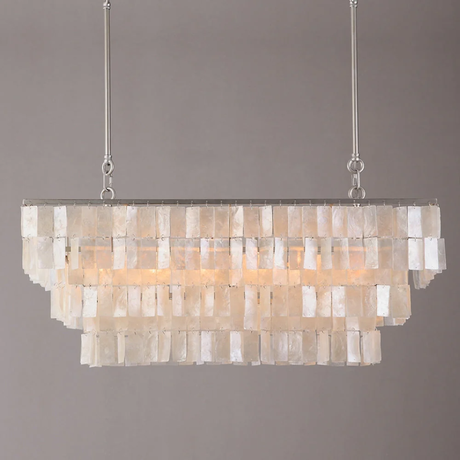 Chandelier with shell-like design on a gray background
