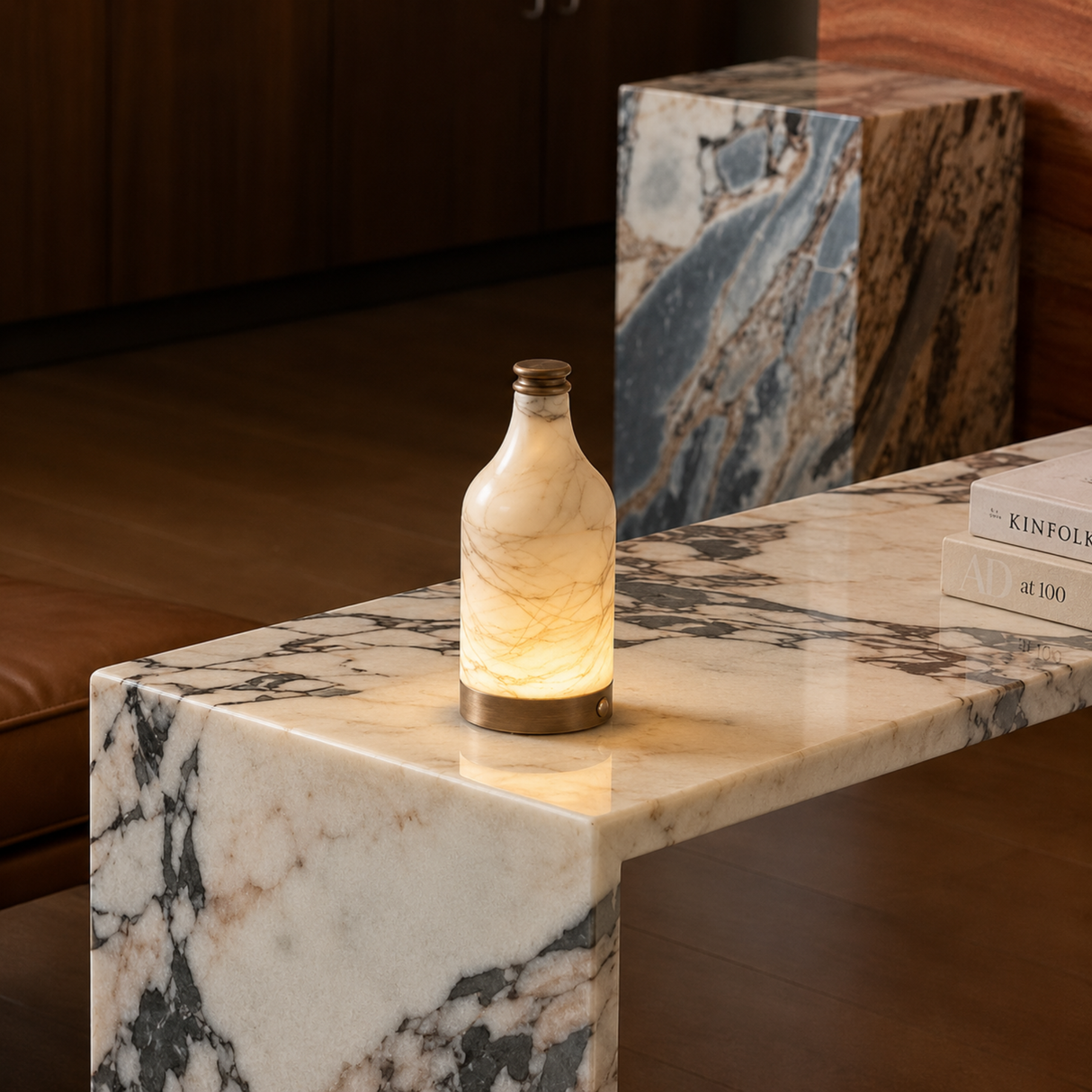 Decorative bottle lamp on a marble surface with a blurred background