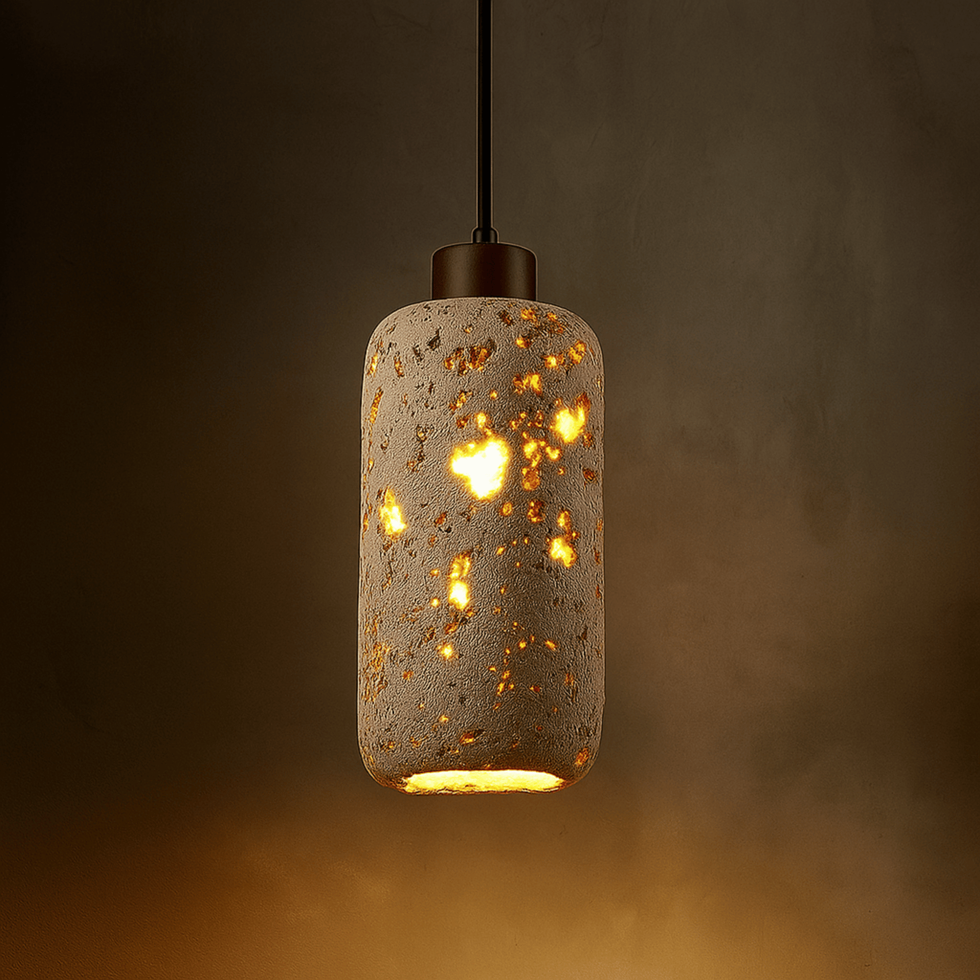 Decorative pendant light with a textured concrete-like finish on a dark background