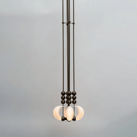 Modern pendant light with glass shades on a gray background