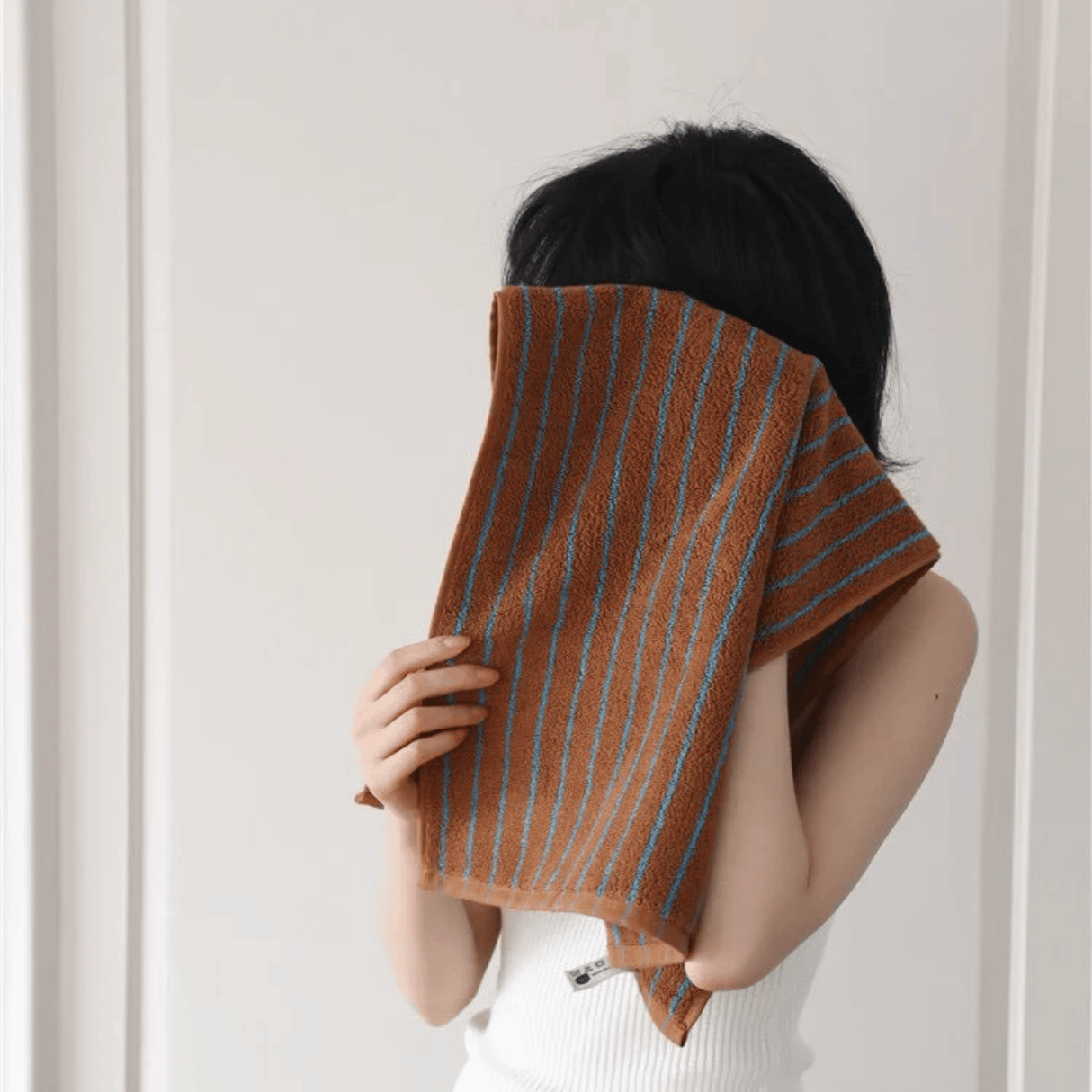 Brown and turquoise bath towel