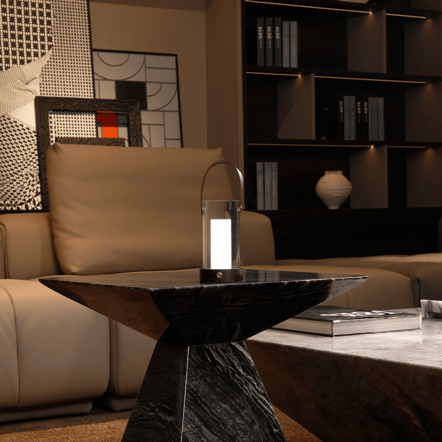 Modern living room with a black side table, beige sofa, and decorative wall art.
