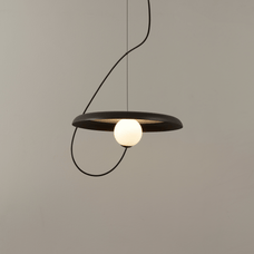 Black MagnoGlow Magnetic Pendant Light styled in a bedroom — minimalist interior by Baskoraa