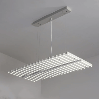 Modern pendant light fixture hanging from a ceiling