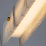 Close-up of a modern light fixture with a neutral background