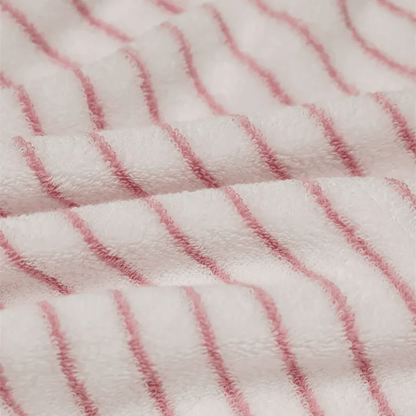 Close look at a cotton pink and white towel
