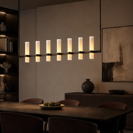 Modern chandelier in a dining room setting with a neutral color palette.