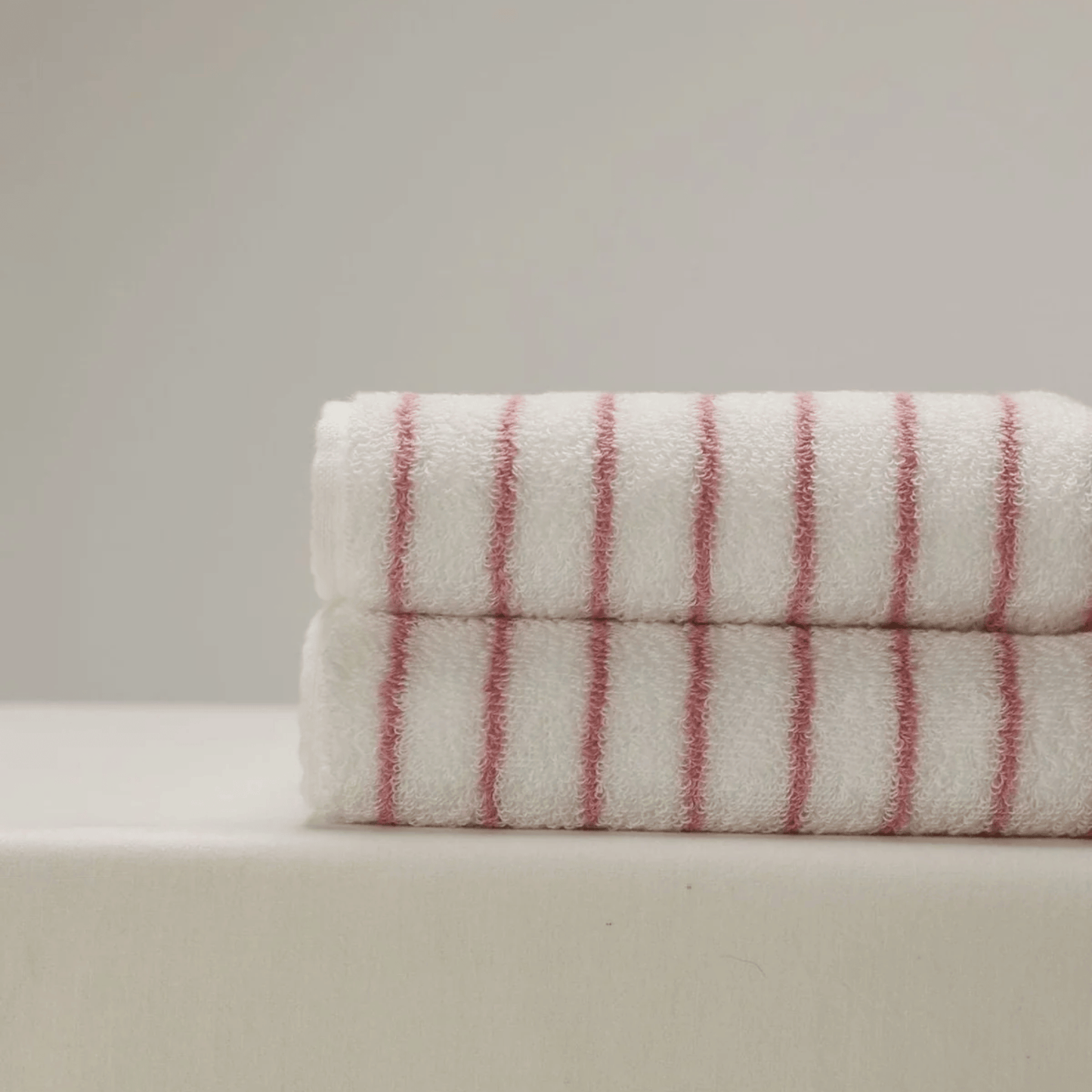 Set of pink and white towels