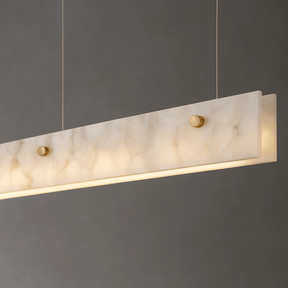 Marble-textured pendant light fixture on a dark gray background